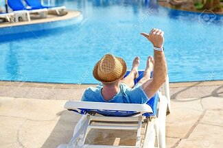 104153973-relax-in-the-pool-summer-young-and-successful-man-lying-on-a-sun-lounger-at-the-hotel-on-the-backgro.jpg.4254c8f571ae9521f8a5550164f4719c.jpg